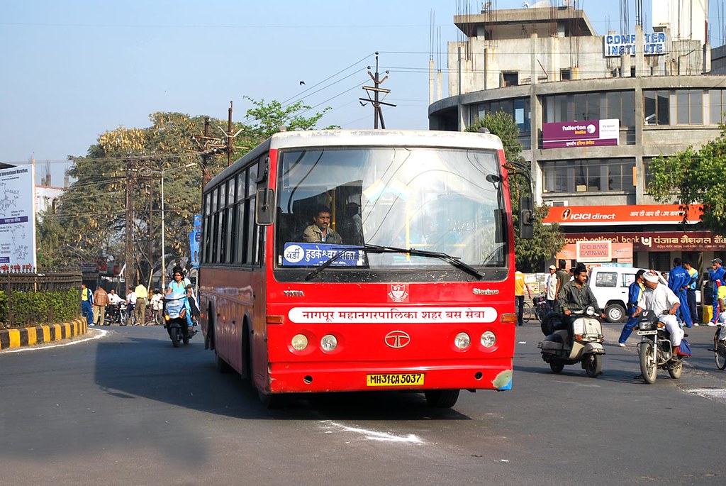 Nagpur Apli Bus: Holi festival celebration with colorful powder and people enjoying festivities.
