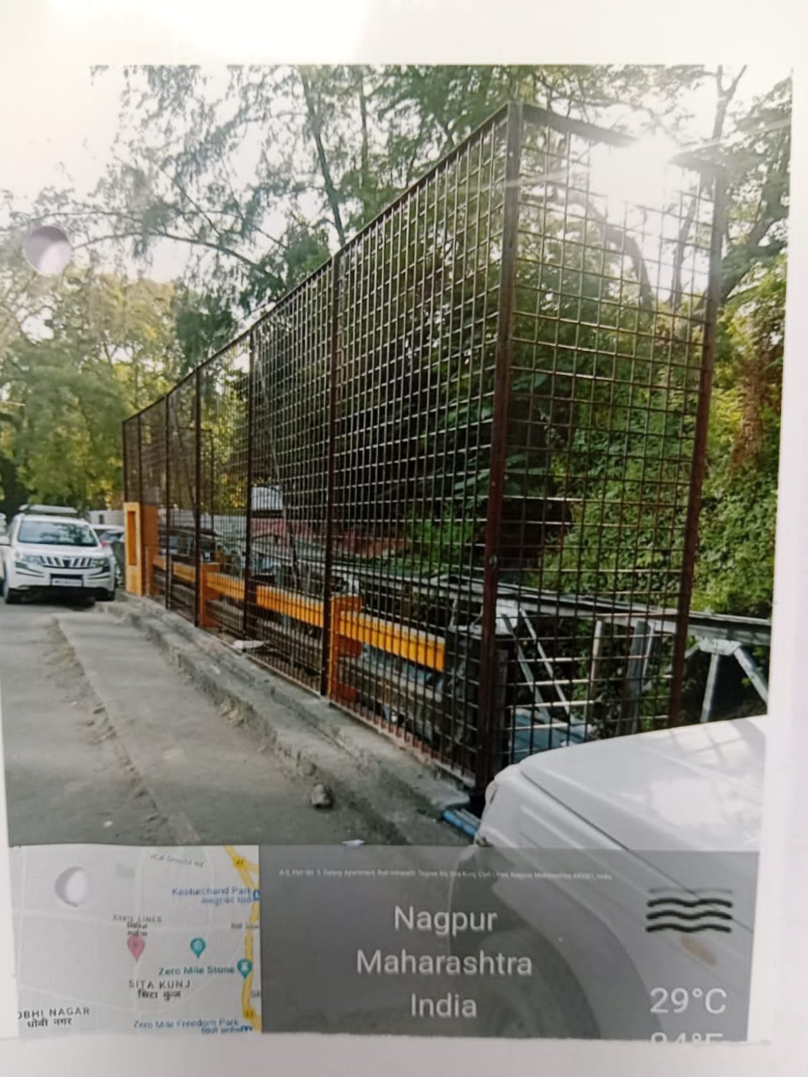 Iron mesh installation on Nagpur bridge to prevent garbage dumping