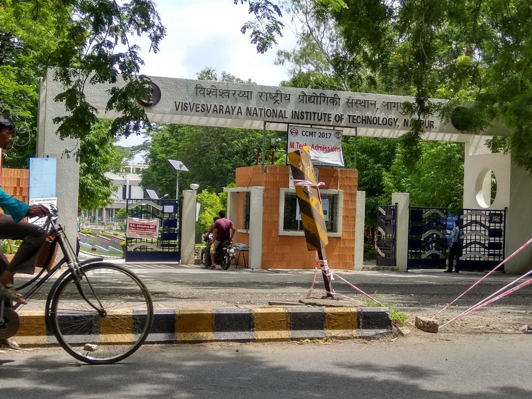 Ambazari Construction: A bustling two-wheeler traffic lane through VNIT campus, representing community relief and efficient traffic management.