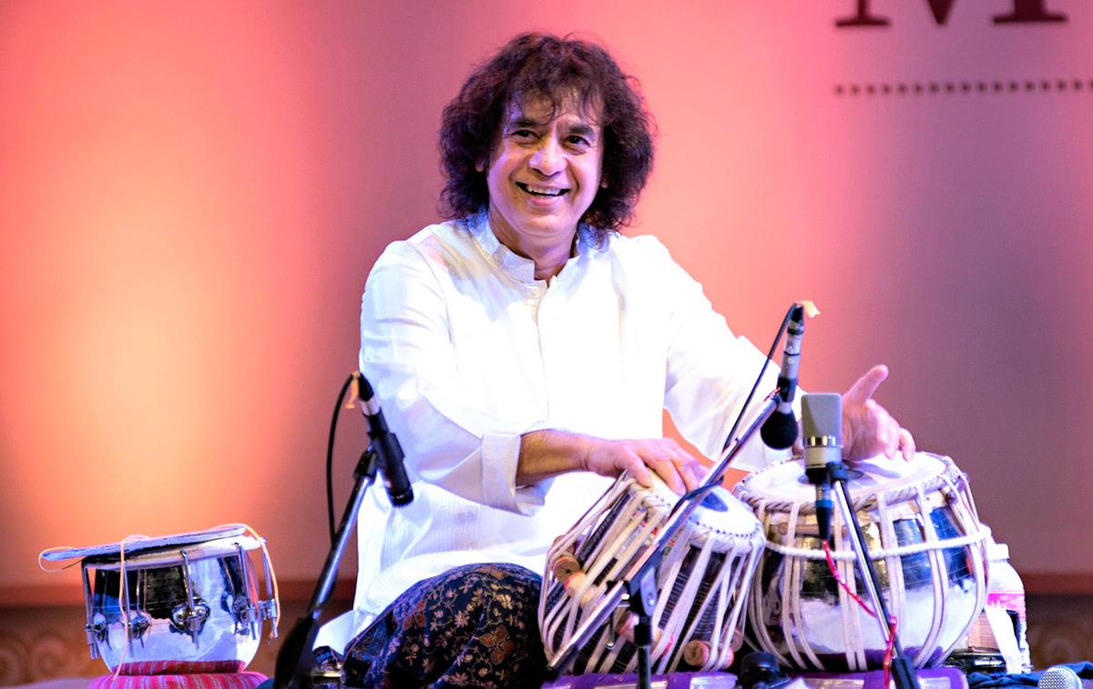 Zakir Hussain performing on the tabla, symbolizing his unmatched legacy in Indian classical music.