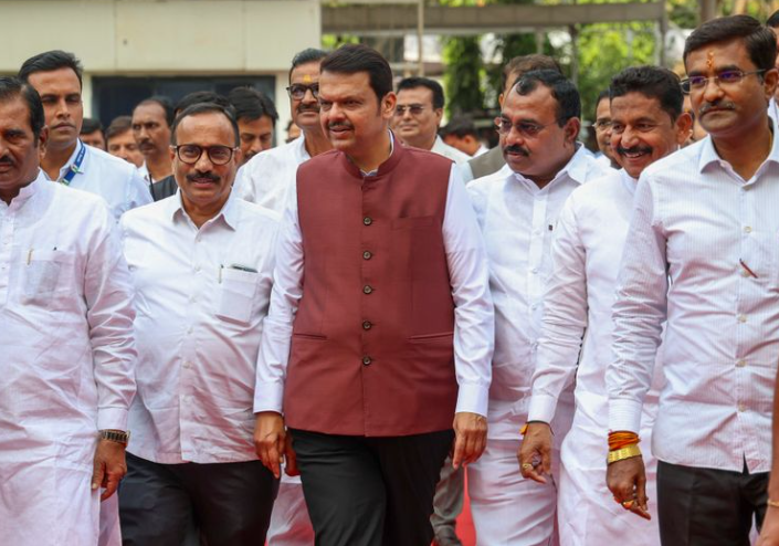 Maharashtra cabinet expansion meeting highlights the political strategies and key portfolios at stake. Shiv Sena , BJP
