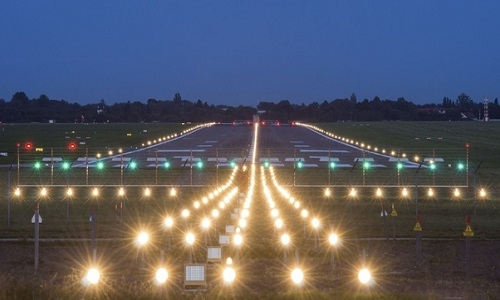 Aerial view of Dr. Babasaheb Ambedkar International Airport's runway undergoing recarpeting work.