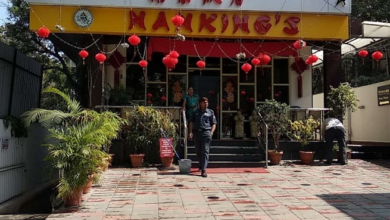 NMC fire safety officials outside Nanking Hotel Nagpur after sealing the premises over fire NOC and safety compliance violations