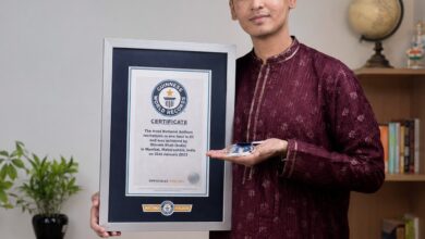 Nagpur teenager Hiten Dharpure holds Guinness World Record certificate for world's smallest robotic arm at 39.25mm — School of Scholars Nagpur January 2026