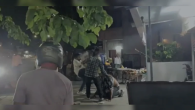CCTV footage of road rage incident near Mankapur Chowk Nagpur June 28 2026 — 7-8 bikers drag on-duty policeman from car and assault him in public view, 14 accused arrested